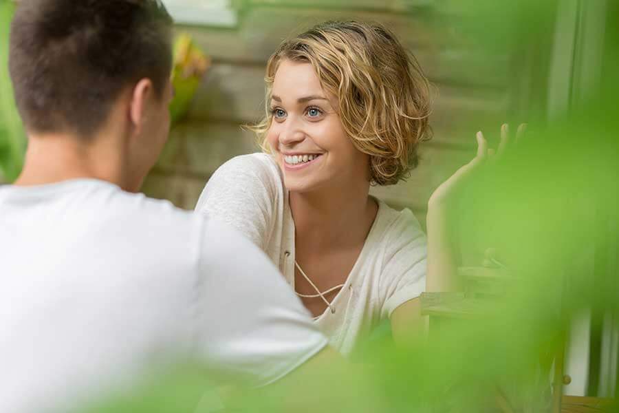 Woman talking to man about Serenity House Health